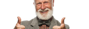 Old man with a big beard and a smile on white background